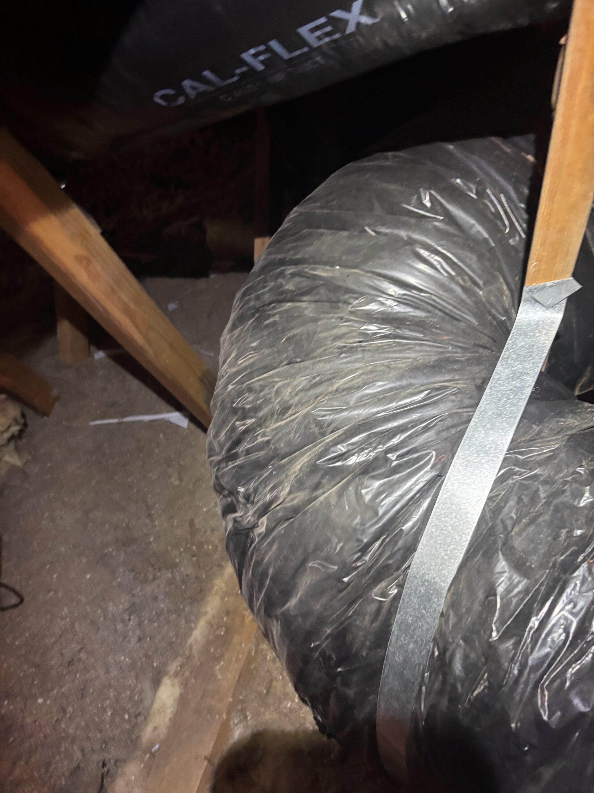 Attic ducting and furnace flue area after vent repair in Lincoln CA