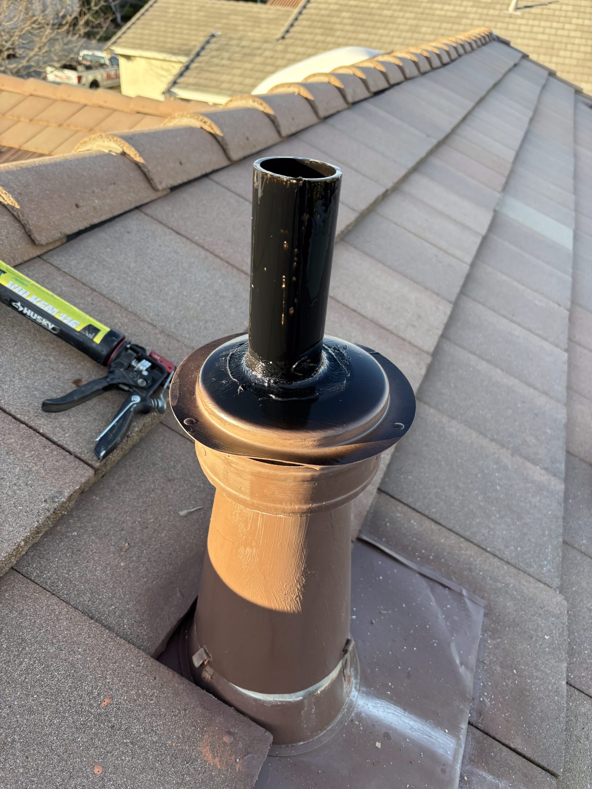 Finished furnace flue roof penetration after HVAC repair in Sun City Hills Lincoln